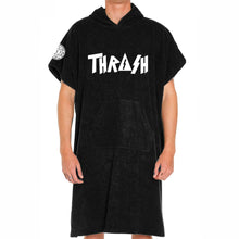 Load image into Gallery viewer, Black poncho with &#39;THRASH&#39; logo worn by a person on a white background